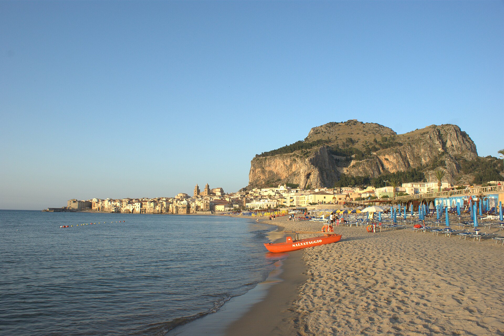 Cefalù beach with the sea and La Rocca